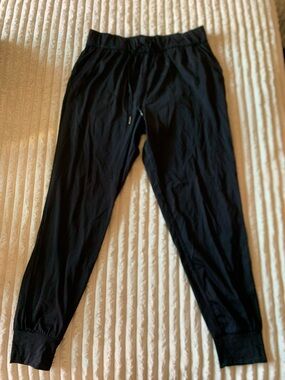 Men's Black Jogger Pants with Elastic Waist and Cuffed Ankles
